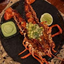 Limusina signature dishes Lobster Al PastorYucatan Red SnapperLong-Bone Short Rib Quesabirria